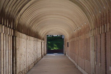 Naklejka na ściany i meble Endless view of a walk with its columns
