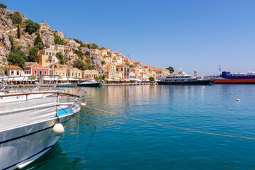 Fototapeta na wymiar Beautiful Symi island with sea bay and colorful architecture, Dodecanese, Greece