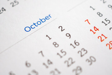 October calendar page with months and dates business planning appointment meeting concept