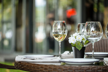 Served restaurant table outside summer terrace 