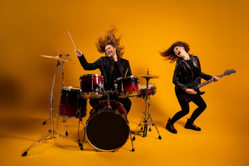 His he her she nice attractive fashionable excited cheerful cheery overjoyed couple playing music...