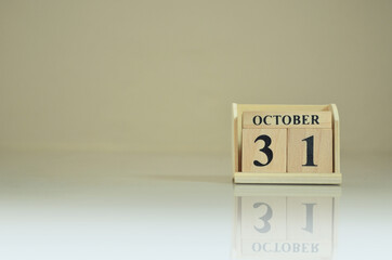 October 31, Number cube with the reflection on the ground.