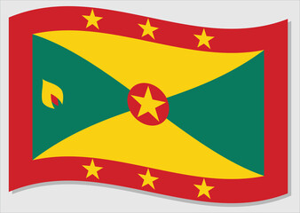 Waving flag of Grenada vector graphic. Waving Grenadian flag illustration. Grenada country flag wavin in the wind is a symbol of freedom and independence.