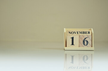 November 16, Number cube with the reflection on the ground.