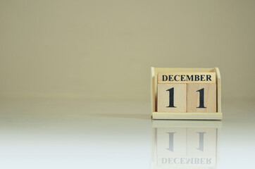 December 11, Number cube with the reflection on the ground.