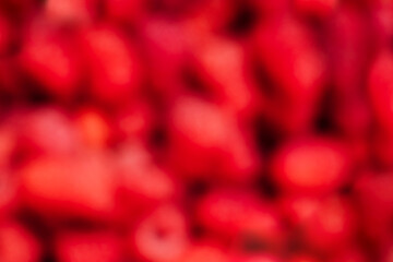 Blurred texture background of raspberry berries