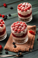 Parfait with granola, berries and whipped cream. fresh raspberry dessert, catering