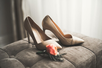 White stylish wedding shoes for bride. Close-up