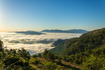 Sunrise views from the Montcabrer mountain with Cocentaina castle at right, Cocentaina.