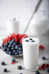 fresh kefir in a glasses with berries