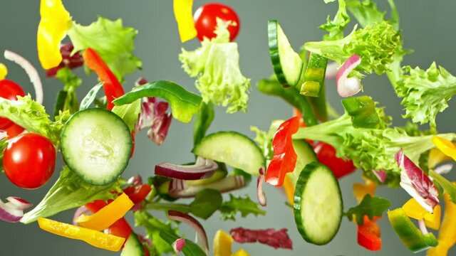 Super Slow Motion Shot of Flying Fresh Vegetables. Super slow motion at 1000 fps..