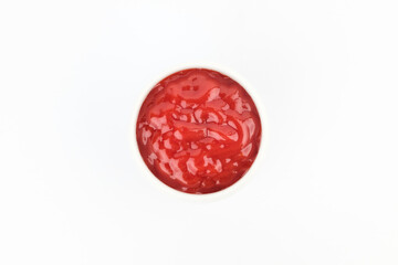 Tomato ketchup on white background
