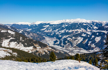 Fototapeta na wymiar Aerial view of Mayrhofen village in Austrian alps from ski slope. 