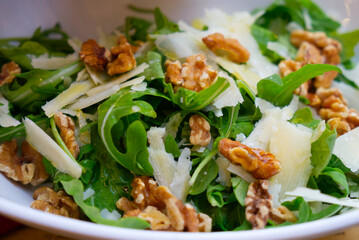 Salad with nuts and grated cheese