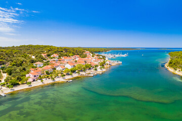 Town of Veli Rat and waterfront on Dugi Otok island on Adriatic seascape in Croatia, aerial view 