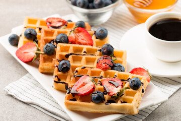 Photo of Belgian waffles. Dessert breakfast concept. 
