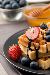 Photo of Belgian waffles. Dessert breakfast concept. 