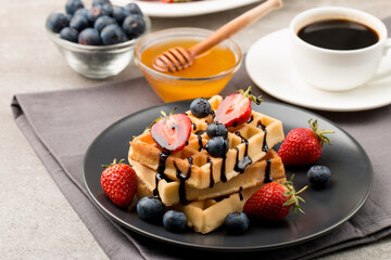 Photo of Belgian waffles. Dessert breakfast concept. 