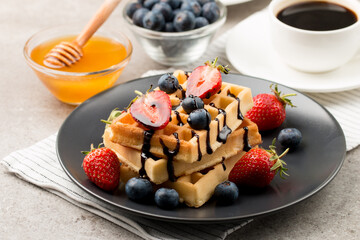 Photo of Belgian waffles. Dessert breakfast concept. 