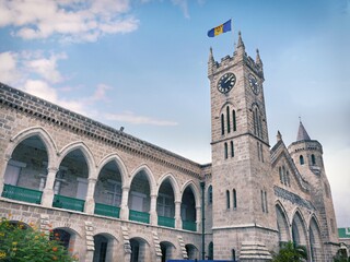 Parliament Buildings in Bridgetown, Capital City of Barbados - With Barbados Flag and Clock Tower