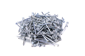A bunch of metal nails isolated on a white background. Pile of nails. Scattered nails