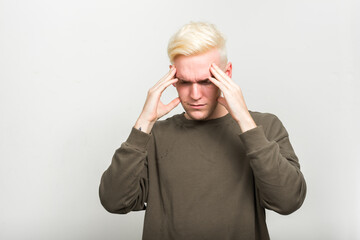 Portrait of young man with blond hair