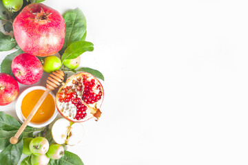 Rosh hashanah, jewish New Year holiday concept, banner. With traditional symbols, apples, pomegranate, honey. Rosh hashanah greeting card background.
