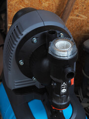 close-up of a part of a home water pumping station. Home water supply equipment