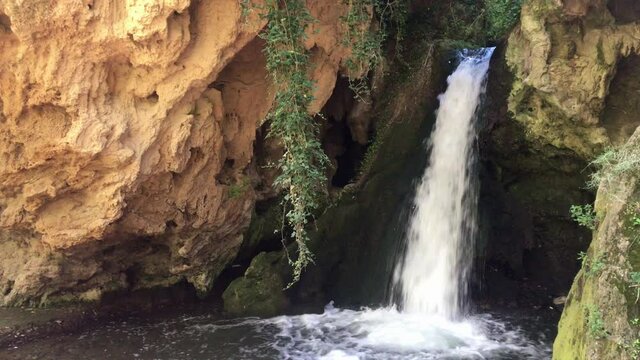 Small waterfall on the mountain. A waterfall near the town of Los Fayos (Zaragoza, Spain), called "Cascada de las Truchas" (waterfall of the trout)