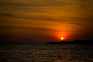 Fototapeta na wymiar Sunset on Mui Ne beach in Vietnam