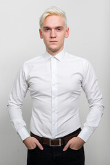 Portrait of young businessman with blond hair