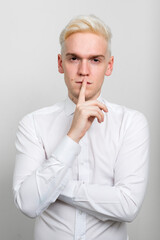 Portrait of young businessman with blond hair