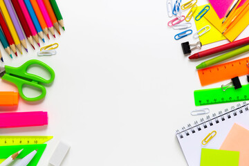 School colorful supplies border on white, flat lay, top view, back to school, copy space, mockup