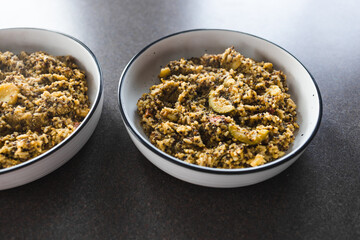 plant-based food, vegan pesto quinoa and rice with mediterranean vegetables