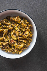 plant-based food, vegan pesto quinoa and rice with mediterranean vegetables
