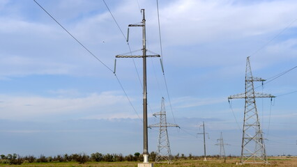 
Electric pole with wires in the countryside