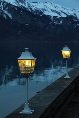 Lanterns on the shore of a mountain lake