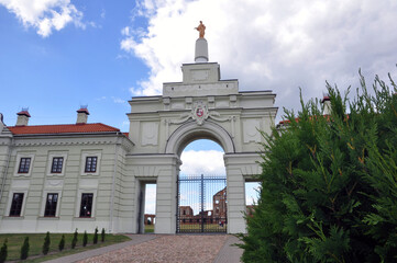 Fototapeta na wymiar The entrance gate to the palace and great ensemble of the Sapieha family - Ruzhany Palace, Belarus
