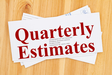 Quarterly Estimates word message on business envelope addresses to IRS