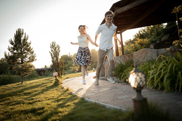 Fototapeta premium The young cute couple on nature