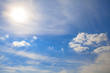 Fototapeta premium Sundial and light clouds . Summer daytime heaven