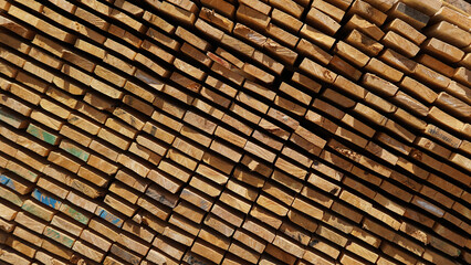 Stacked pine lumber, sawn boards as background