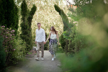 Fototapeta premium The young cute couple on nature