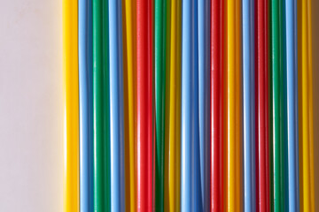 Abstract Background Multicolored Plastic Drinks Tubes. Close-up.