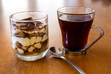 Traditional italian dessert tiramisu cake with coffee