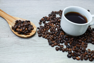 View of a cup of coffee beans and cup
