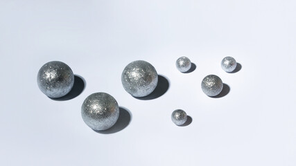 Baner with shiny hristmas balls with a hard shadow. Holiday concept.