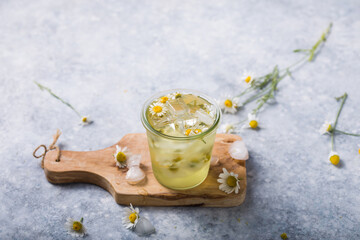Boozy Long Island Iced Tea with chamomile flowers