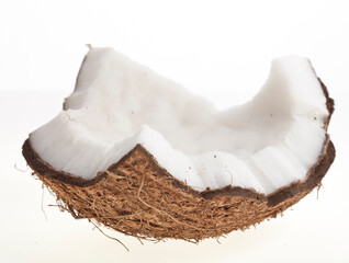 Coconut piece isolated on a white background.