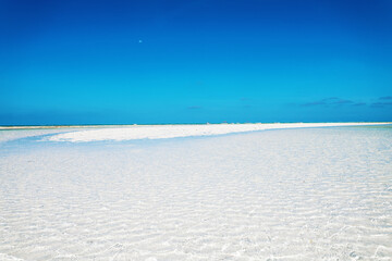 Minimalistic landscape with white sand bank in Zanzibar
